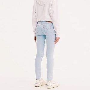 Levi’s 711 skinny white light wash jeans 25